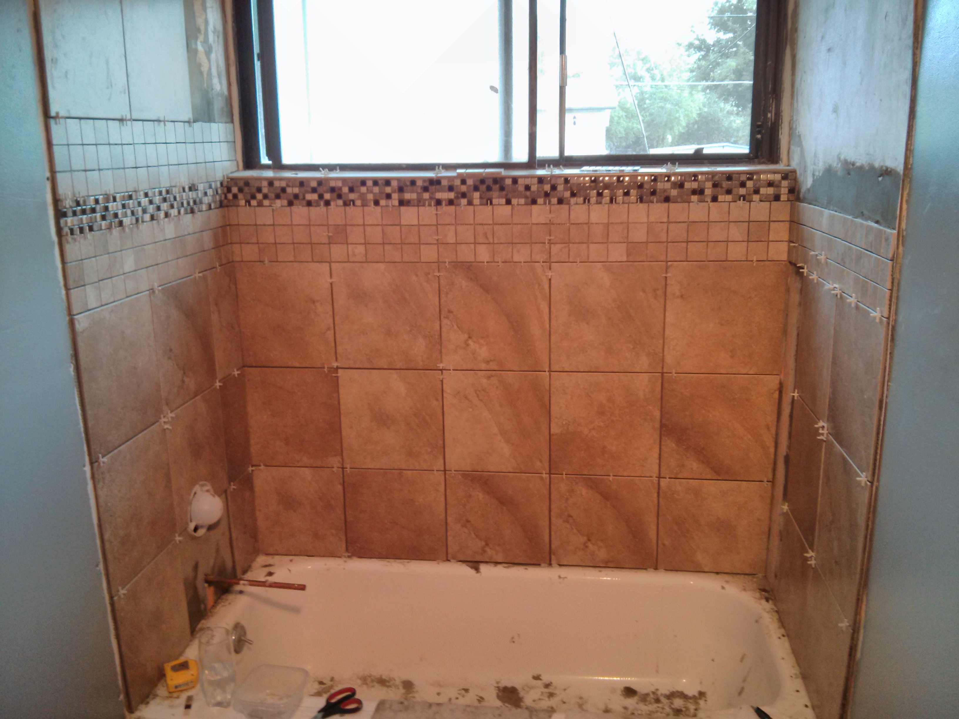shower, mostly tiled