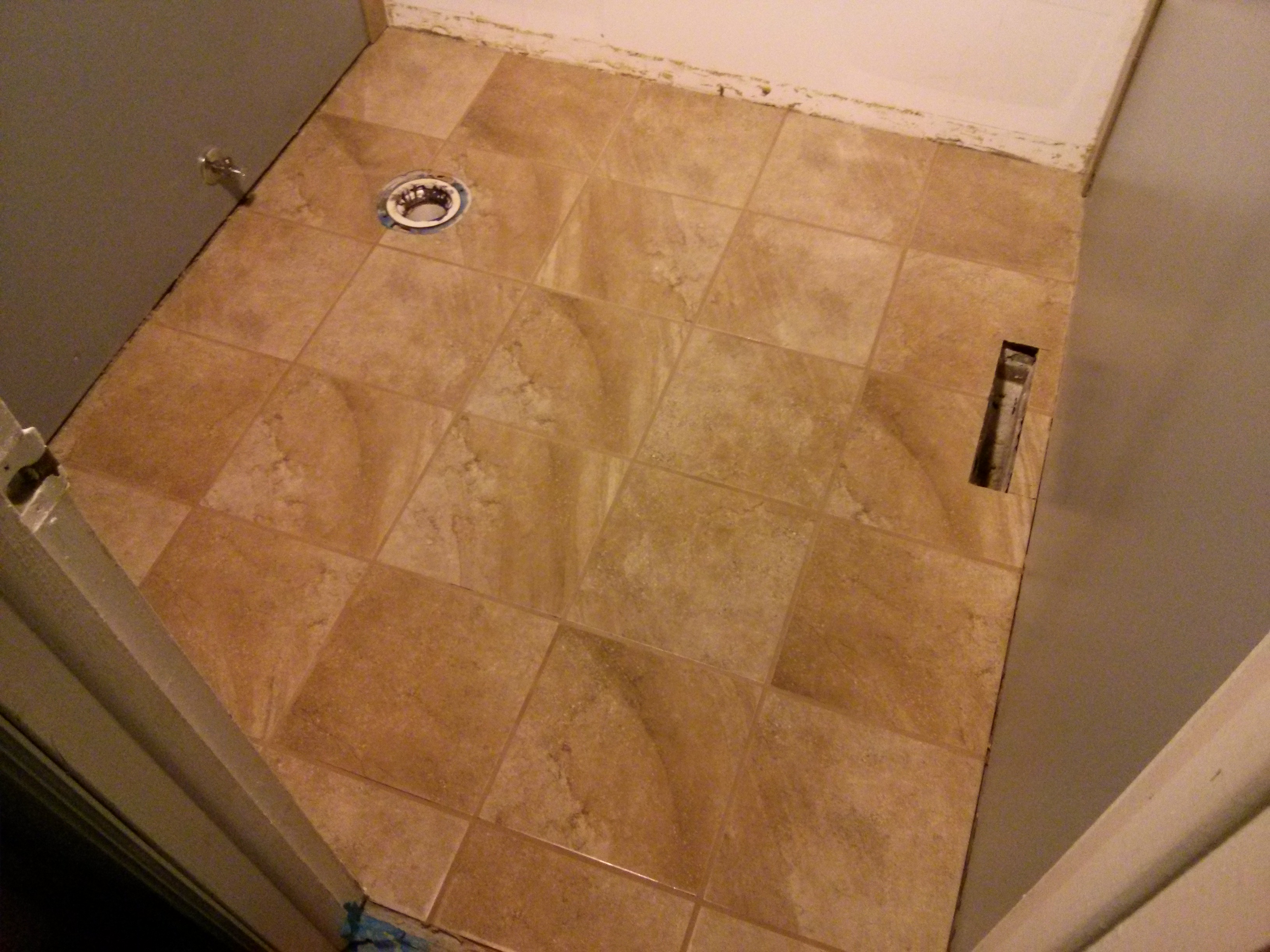 tiled and grouted bathroom floor