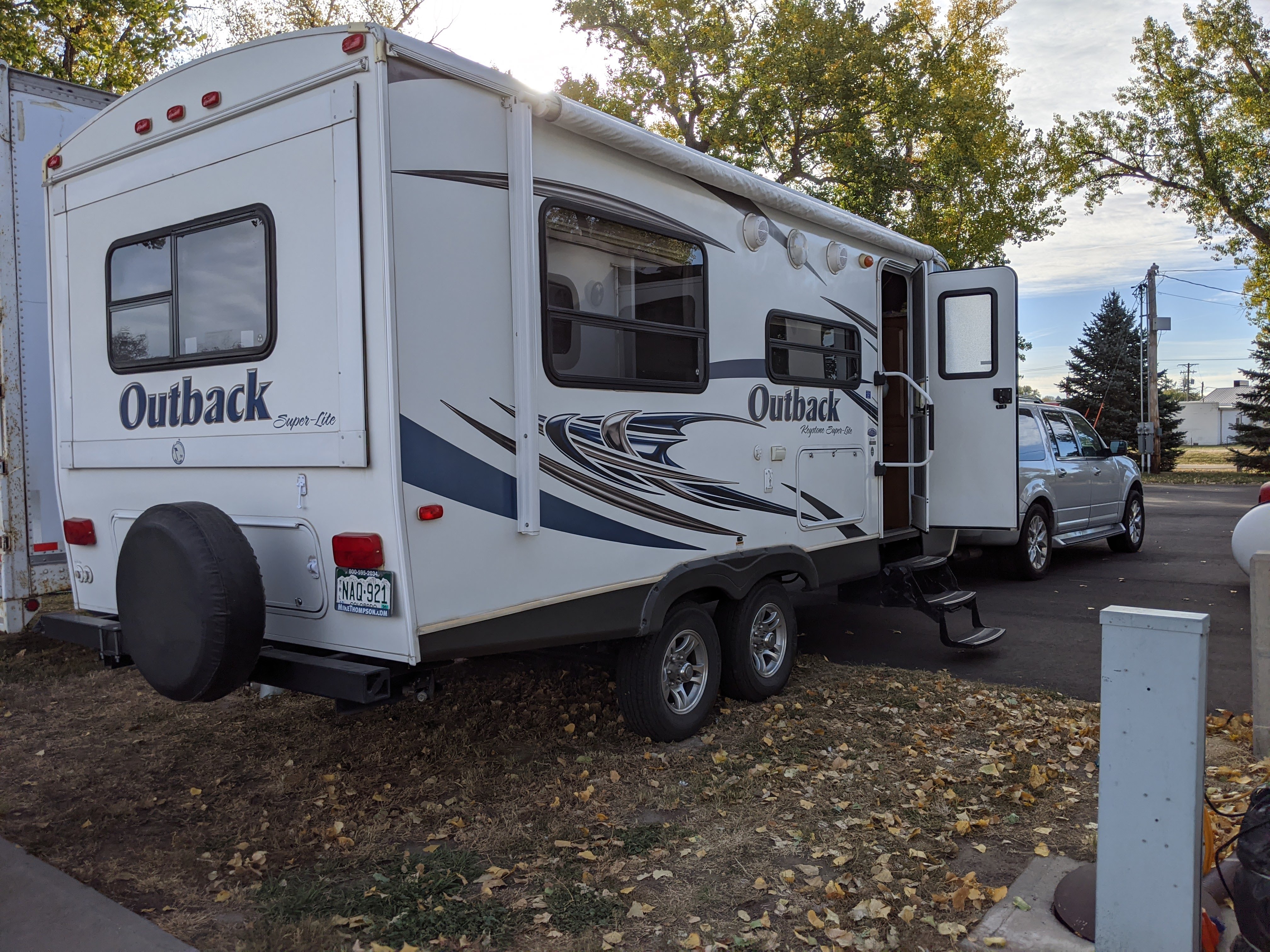 rig close to others in paved RV park(ing lot)